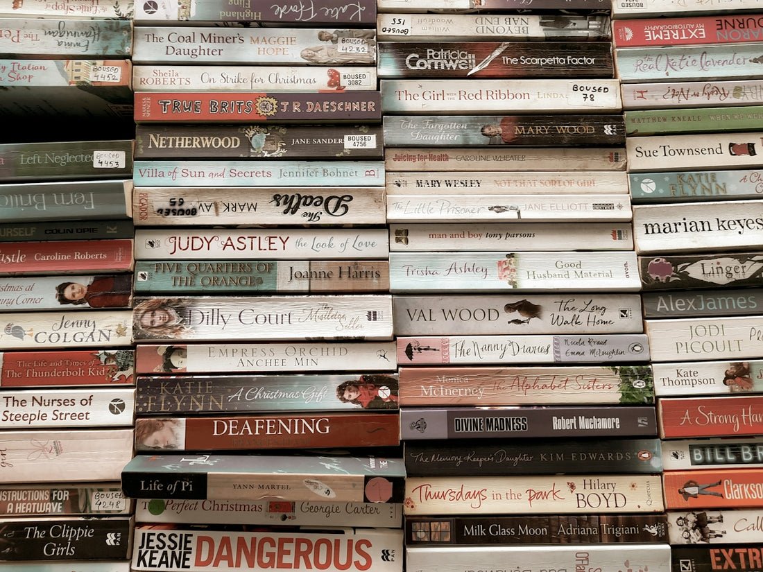 a pile of books stacked on top of each other