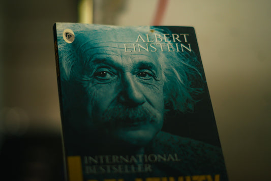 A book about albert einstein is displayed.